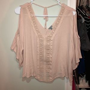 Flowy light pink shirt with crocheted detailing